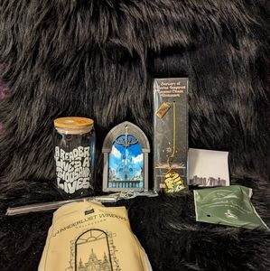 Bookish box tumbler, annotated overlays, bookmark, book sleeve and window scene.